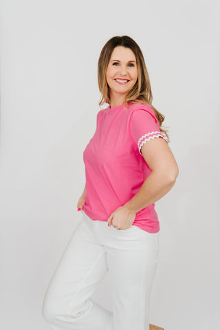Pink top with white ricrac trim